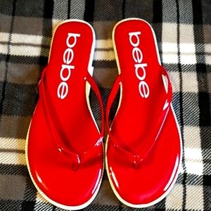 Red BeBe flip flops size 8.5 women brand new